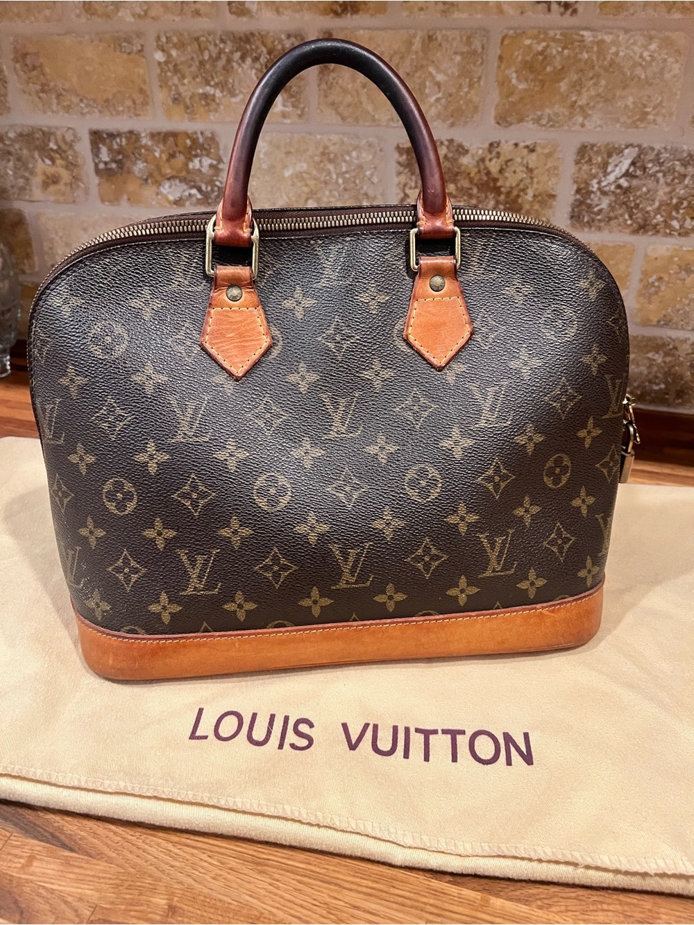 90’s VINTAGE  Louis Vuitton Monogram Alma Satchel in Brown and Tan